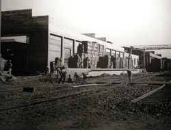 Stacks of apple boxes are on the loading dock on the rear of the Hallberg Apple cannery and packinghouse in Graton