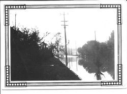 Flood waters on Santa Rosa Avenue (Sebastopol Avenue), looking east toward the Laguna de Santa Rosa in Sebastopol, California, 1940s