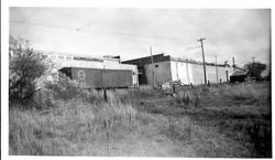 Railroad boxcar on siding on backside of O. A. Hallberg & Sons apple processing plant in Graton