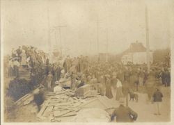 Large crowd of men and women surround a California Northwestern (CNW) engine during the Battle of Sebastopol Avenue, March 1, 1905 between the electric Petaluma & Santa Rosa Railway and the steam California Northwestern (CNW) railroad right-of-way