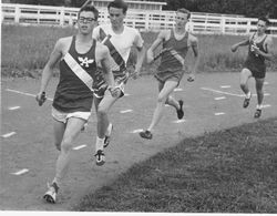 Analy High School Tigers track, 1960s--during the B medley relay, Don Madronick of Analy leads the pack on a turn