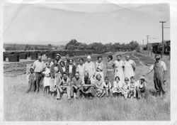 Group of O. A. Hallberg & Sons workers behind the cannery in Graton, California, 1930s