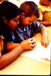 Unidentified mother and child drawing pictures, possibly at Analy Nursery School, Sebastopol, California