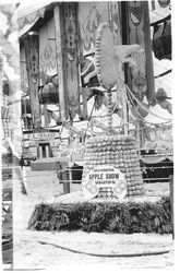 Gravenstein Apple Show of, about 1930s exhibit of a dog jumping through a hoop--all made of apples