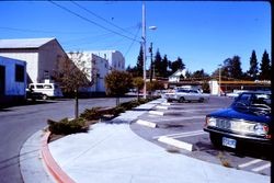 Parking lot on Weeks Way, Sebastopol, California, 1970, with Purity Supermarket in background