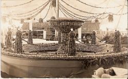 1914 Gravenstein Apple Show display of large fountain made of whole and dried apples, postmarked Sebastopol, California, 1914