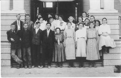 8th grade class standing on steps of the new Sebastopol Grammar School, 1908 or 1909