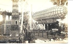 1913 Gravenstein Apple Show display of a dirigible and a display of the Eddystone lighthouse by the Jonive District