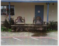 Two school bells taken from Pleasant Hill and Spring Hill Schools and placed at Twin Hills School