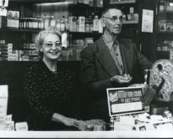 George Pease and Mildred Meeker in Pease Pharmacy, located at corner of North Main and Bodega (Highway 12) in Sebastopol, California