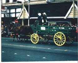 Hal Skinner and Geoffrey Skinner driving a Studebaker California rack wagon in the 1975 Apple Blossom Parade down Main Street, Sebastopol