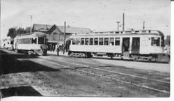 Two P&SR passenger cars on South Main Street Sebastopol near the P&SR depot