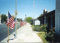 American flags line South Main Street of Sebastopol, California, near the West County Museum, 2002