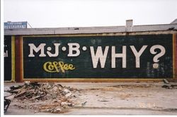 Demolition of the R. S. Basso building on North Main Street, about 1980