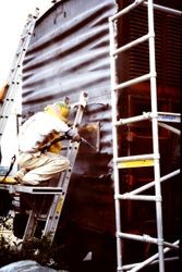 Pacific Fruit Express boxcar being refurbished and sand blasted for the West County Museum at 261 South Main Street in Sebastopol, California, 1995