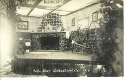 1914 Gravenstein Apple Show with an apple display of a child at the Cross made of whole and dried apples, sponsored by the Marshall District