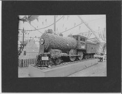 1910 Gravenstein Apple Show display of train engine made of apples by James Morse and Frank Huntley, Sebastopol
