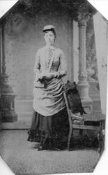 Unidentified young woman (possibly friend or family member of Otis Allen family) in Victorian dress, about 1870