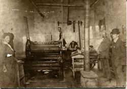 Mrs. McDonell (Ivy), Alanson Folger, Jr., Frank Kimball, Charley Gallagher and J. P. McDonell inside J. P. McDonell's printing press in 1904 Sebastopol, California, 1904