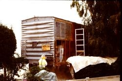 Pacific Fruit Express boxcar being refurbished and sand blasted for the West County Museum at 261 South Main Street in Sebastopol, California, 1995