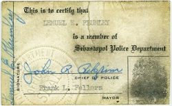 Sebastopol Police Officer Lemual "Shorty" Plumley's ID card signed by Chief of Police John R. Pilgrim and Mayor Frank L. Fellers with Plumley's fingerprint