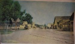 Downtown Sebastopol in 1881 with people horse and buggies and buildings on either side of the dirt street