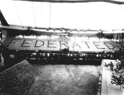 Gravenstein Apple Show, about 1930, with a display by "Federated" apple growers and a sign "Sonoco"