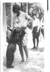 Bunni Cornelia E. Myers with bear cub, about 1925