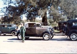 Vintage cars visit the Hallberg Apple Farm roadside stand, October, 1982