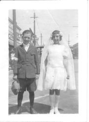 Geraldine Perry and Vergil Mello dressed for their First Confirmation ceremony, 1930s