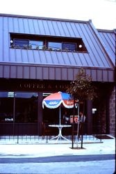 Coffee and Company store with table and umbrella in front at 6930 Burnett Street in Sebastopol, California