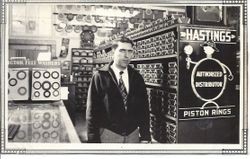 Delbert Triggs in his father's auto parts shop, September 8, 1934