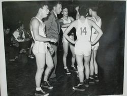 Analy High School Tigers basketball 1949--Coach Walt Foster with ball players during game