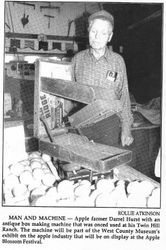 Twin Hill apple farmer Darrell Hurst with an antique box making machine that was once used at his Twin Hill Ranch, about 1996