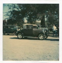 Vintage cars visit the Hallberg Apple Farm roadside stand, October, 1982