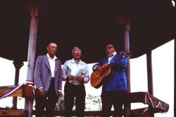 Three men singing in the gazebo at Brookhaven Park in Sebastopol, summer 1976