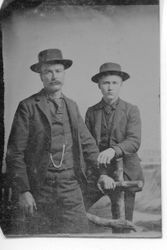 Unidentified man and boy, about 1870