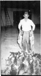 Ivan Roberts displaying his catch of fish