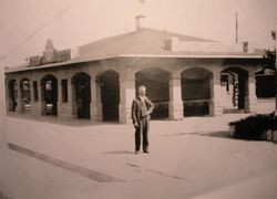 Harry O. White, trainmaster at Sebastopol P&SR railway standing in front of the Depot, 1930s