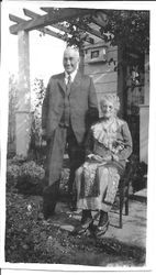 William and Leona Rosebrook sitting on the porch of their farmhouse on Mill Station Road in Sebastopol at the time of their golden wedding anniversary, November 1925