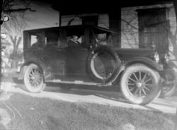 1920s car with unidentified passengers