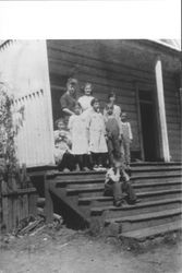 Ruth Meeker Hull and students on steps of Joy School