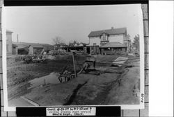 Post Office excavation site filled with water, Santa Rosa, California, 1909