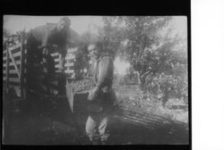 James and Hardin Chenoweth loading cherries onto a truck