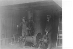 Two men at Western Railroad Lumber Company