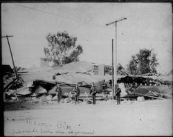 Soldiers on guard at the ruins of the Masonic Building