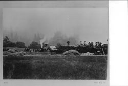 Steam powered threshing machine and crew