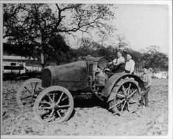 Boys on a tractor at the Lytton Home (the Salvation Army Boys and Girls Industrial Home and Farm in Lytton, California), Lytton, California, 1921