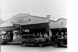 Men and boys in front of H.V. Gonnella Grocery Store