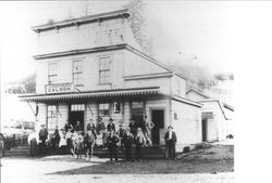 Group standing in front of the Good Friends Saloon